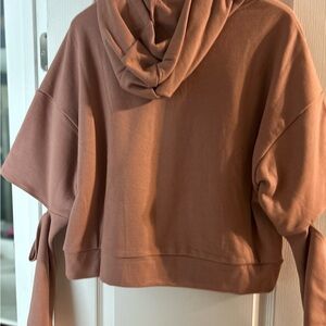 hooded Alo Yoga sweatshirt. Extra long sleeves. Slit around elbows.